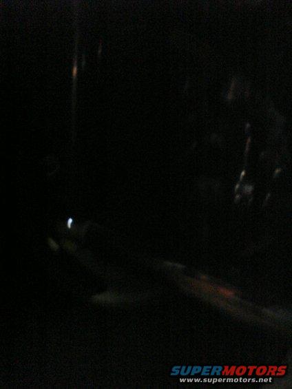 dark interior shot, looks like reflections on a window or dashboard