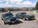 1972 Ford Ranchero - A 1971 Ford Mustang Mach 1 and a 1972 Ford Ranchero are parked side-by-side in a lot with mountains in the background.