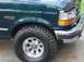 1995 Ford Bronco - This just shows the spacing needed to fit 33's with no lift. The corners of the bumper were trimmed just to be safe.