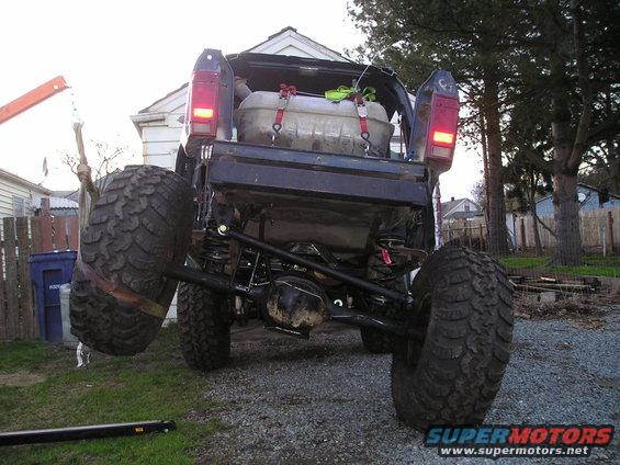 1986 Ford Bronco II rear with oversized tires and auxiliary fuel tank in bed