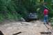 1995 Ford Bronco - A 1995 Ford Bronco navigates a challenging off-road trail.