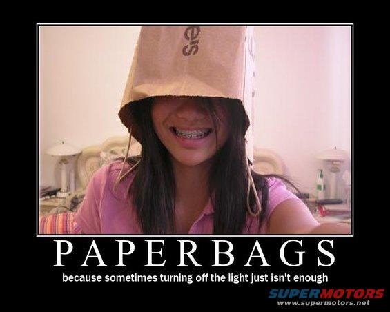 Person wearing a paper bag over their head, smiling with braces. Text reads 'PAPERBAGS'