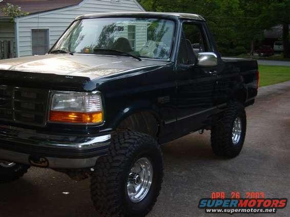 Lifted 1995 Ford Bronco parked in driveway