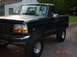 1995 Ford Bronco - This 1995 Ford Bronco features a lifted suspension and large off-road tires.