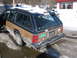 1999 Ford Taurus - This station wagon, with its distinctive wood paneling, is parked in a snowy, icy environment.