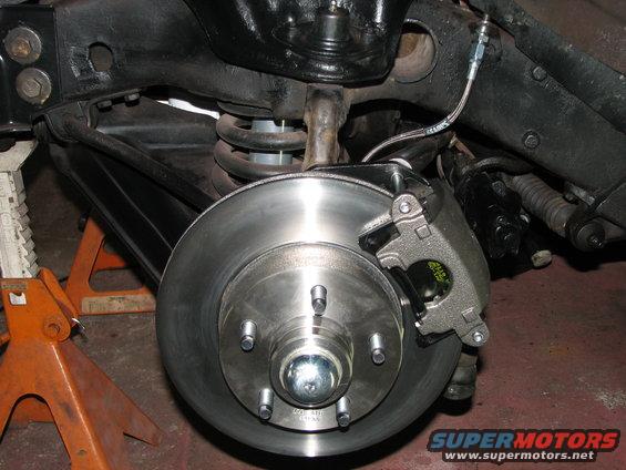 U.S. Brake 2 3/4 piston GM style caliper, Monarch rotors, Back Yard Classics adapters to stock spindle for correct steering alignment.