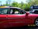 1996 Ford Probe - A man drives a red coupe, with a white Jeep visible in the background. The photo is dated May 18, 2007.