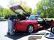 1996 Ford Probe - Vacuuming the interior of a red 1996 Ford Probe at a car wash.