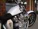 1978 Honda CB500T - A custom white motorcycle with a skull motif is parked outdoors.