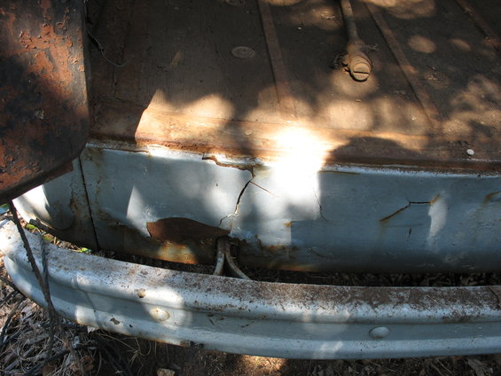 1952 Ford Panel Van rear bumper and lower body panel showing rust and cracking paint