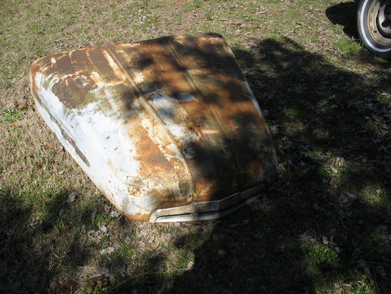 Rusted 1949 Chevrolet C/K Pickup hood with chrome grille detail