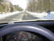 1997 Ford Crown Victoria - Driving through a winter landscape on a snow-covered road.