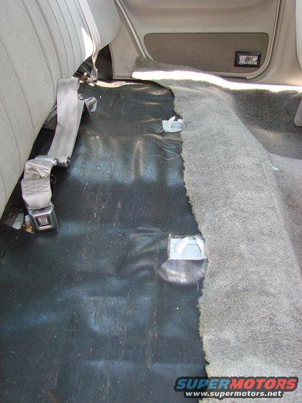 leak-repair-007.jpg This is what is under the rear seat cushion. See the "hooks"? They're white.