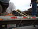 1963 Ford Galaxie - An engine block is being transported on a flatbed trailer with other vehicle parts.