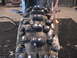 2007 Yamaha YZ450F - A close-up view of a knobby motorcycle tire fitted with metal studs for enhanced traction.