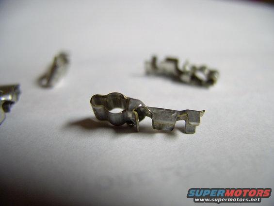 img_0047.jpg That's the best shot I could get of the little "tangs" on the terminal clips. You get four terminal clips with the connector, but you should be able to re-use your stock wires as they don't seem to deteriorate like the connector does.