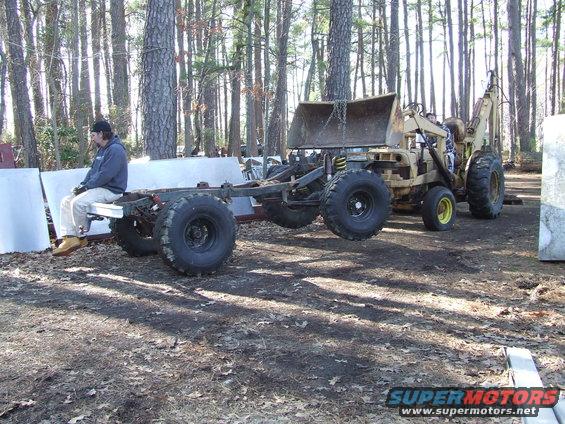 0802160257.jpg Got the frame out of the woods and next to the shop....time to get started!