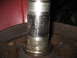 1991 Ford Bronco - Worn wheel bearing spindle showing significant scoring and wear marks.