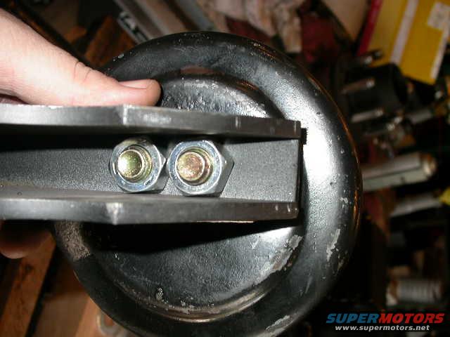 dscn5970.jpg Note that with the 9/16" nuts the sides of the radius arm mounts will hold them captive, so there is no need to hold the nut with a wrench when tightening the bolts.