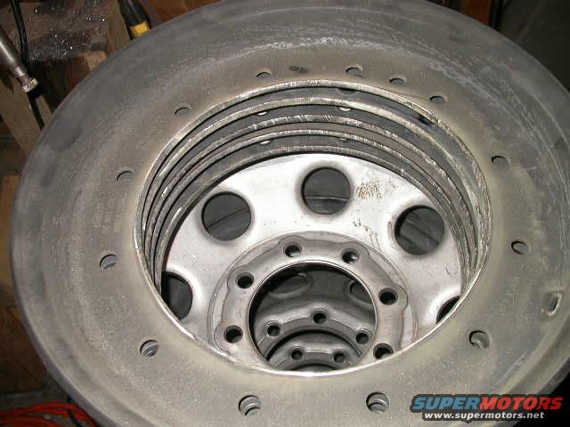 dscn5979.jpg Ground down the rough plasma cut lines on the rim outers.  Not perfectly smooth, but they don't necessarily need to be since they'll be covered with a rock ring anyway.