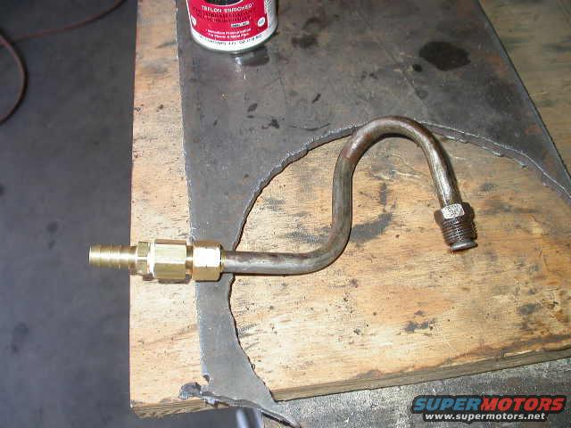 dscn5990.jpg Bent tube 90 degrees, then added a 3/8" compression fitting to 1/4" NPT adapter, which allowed me to hook on a 3/8" barb fitting.