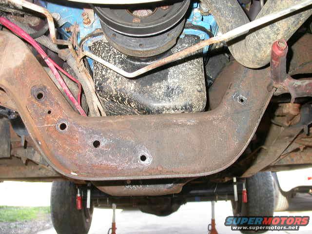 With the stock power steering cooler out of the way I now have room to cut out the front side of the cross member.