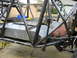 1995 Ford Bronco - Custom race vehicle chassis construction with fuel tank and roll cage visible.