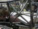 1995 Ford Bronco - Custom chassis construction with engine and roll cage visible, likely for off-road racing.