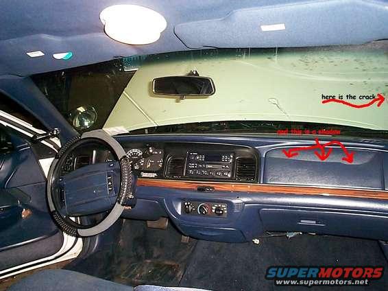 
an interior shot, the line across the dash and windshield are a reflection, there is no crack in the dash or anything, and the windshield crack isnt visible in the pic, its way off to the right. 