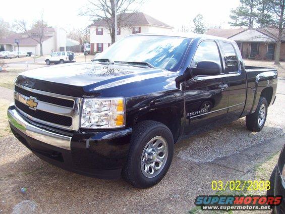 Black 2008 Chevrolet Silverado 1500 pickup truck parked on a driveway