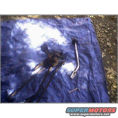 Transmission shifter linkage and knob on blue tarp