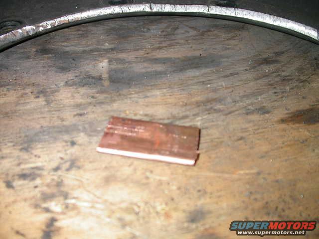 dscn6025.jpg Made a copper backing plate by smashing a short section of copper pipe flat.