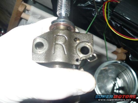 parts-025.jpg RH (passenger) tensioner, using paperclip to try and slip in the slot