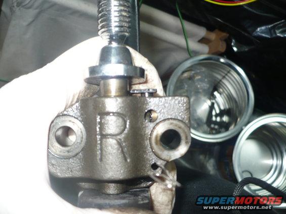parts-027.jpg RH (passenger) tensioner w/ paperclip in latch to keep tensioner compressed
