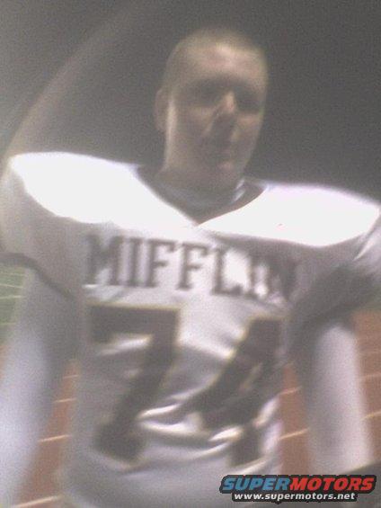 Football player in uniform with 'MIFFLIN' and number '74' visible