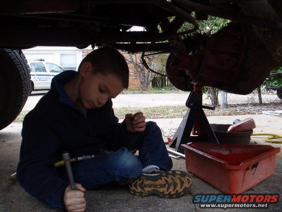p2240003.jpg Got a nut stuck in the socket, but thats ok, the 7 year old knows what to do and look how well he fits under the truck(4" lift w/35's).