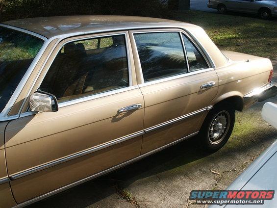 Side view of a tan 1980 Mercedes-Benz S-Class sedan