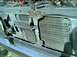 1989 Ford Bronco - Front view of the engine bay of a 1989 Ford Bronco, highlighting the radiator and condenser assembly.