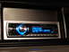 2003 Ford Crown Victoria - Close-up of a Pioneer car stereo display showing 'PANTERA CEMETARY GATES' and song information.