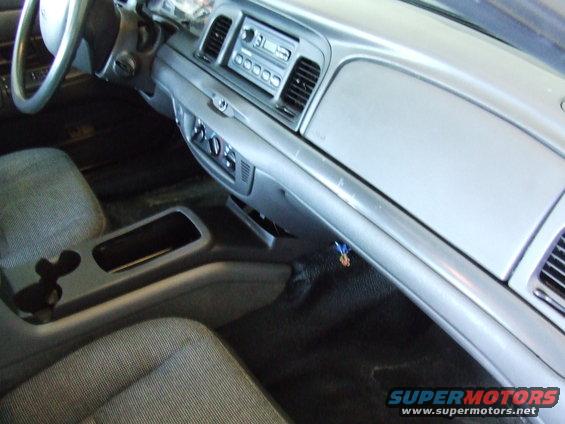 2003 Ford Crown Victoria interior showing dashboard, center console, and seats