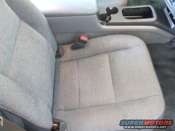 Front passenger seat and center console with cup holders