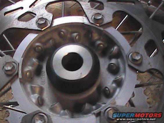 Motorcycle wheel hub with spokes and brake rotor