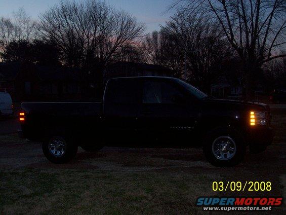 Black 2008 Chevrolet Silverado 1500 pickup truck parked outside at dusk