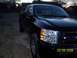 2008 Chevrolet Silverado 1500 - A black pickup truck is shown from the front three-quarter view, with a date stamp indicating March 9, 2008.