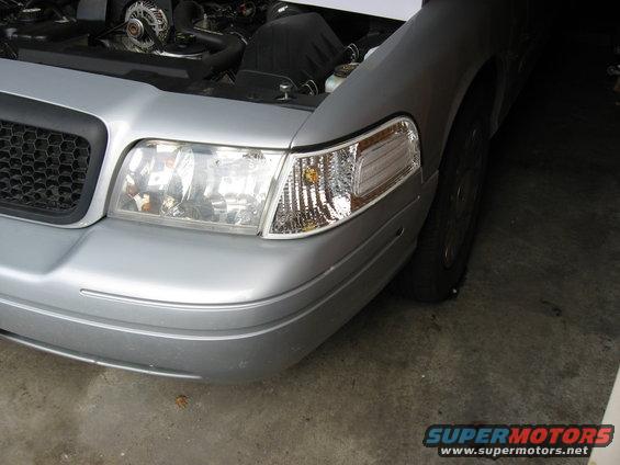 2004 Ford Crown Victoria front end, hood open showing engine components