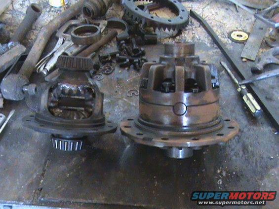 Two differential assemblies and gears on a workbench