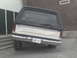 1985 Ford Bronco - rear view of her arcing out