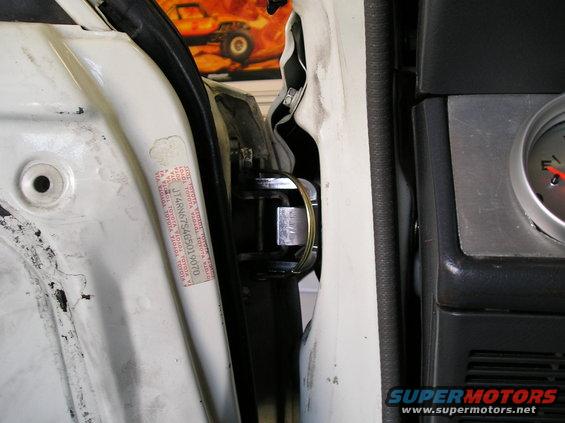 White door jamb with VIN sticker and gauge visible. 1986 Toyota Hilux