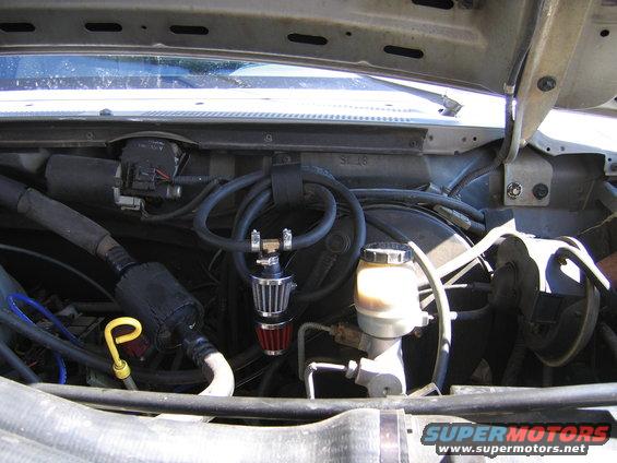 vent-lines-019.jpg all lines routed through wiper motor wiring harness holder, and connected to a couple a cheap filters from parts store, trans and t-case to one, and diffs to the other