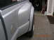 2008 Ford F-450 - Close-up of the rear fender and dually wheel on a silver 2008 Ford F-450 pickup truck.